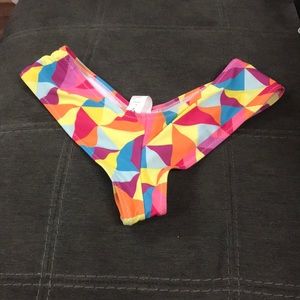 New never worn. V shaped cheeky bikini bottom.